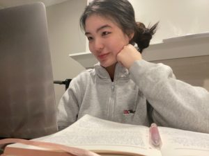Michelle Au on computer
