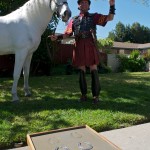 USC's official mascot creates a set of hoof prints in cement.