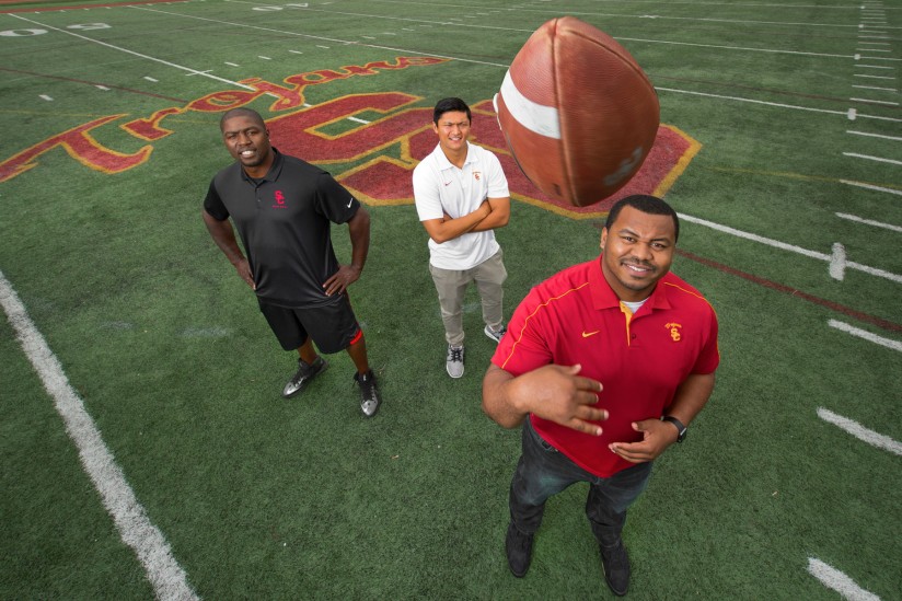 Three football coaches