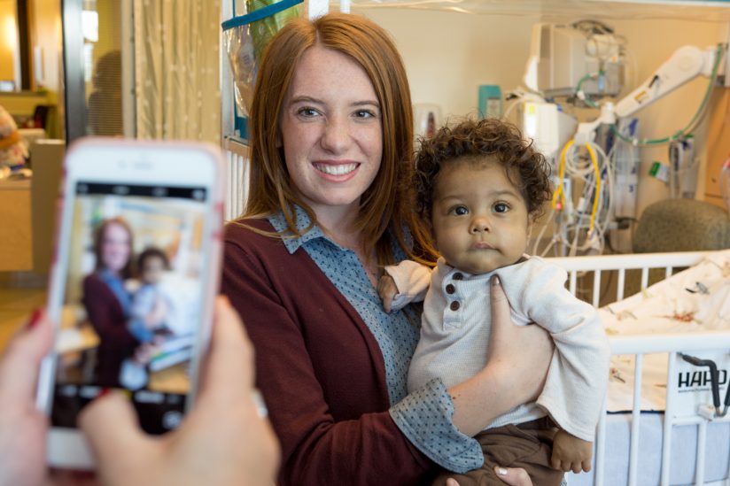 Lydia Hand holds Donovan Daniels