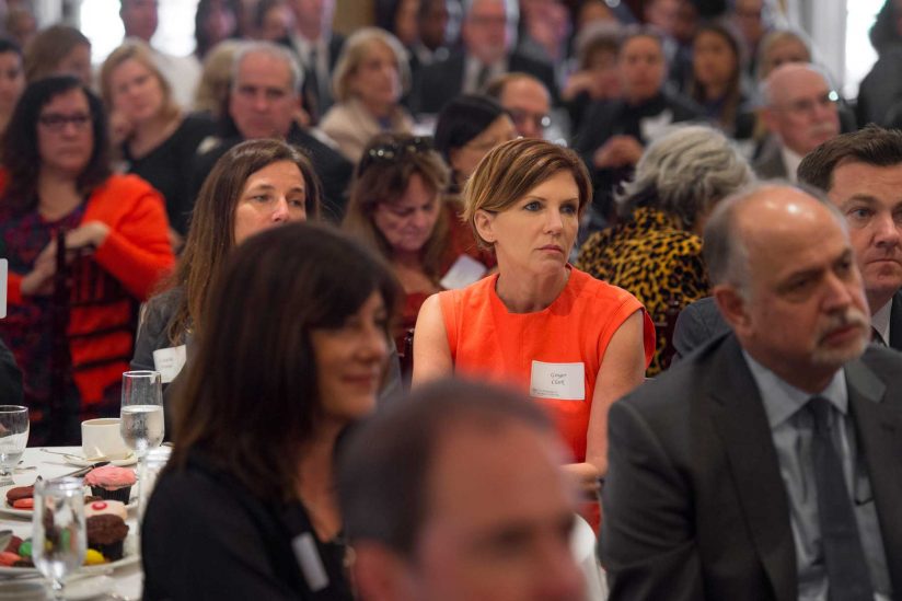 audience listens to speech