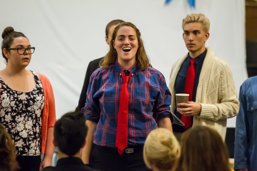 students singing in opera