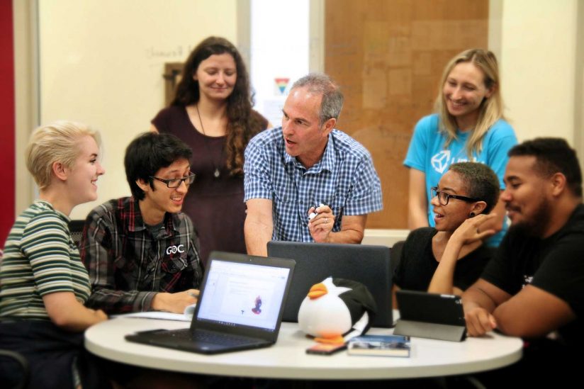 Danny Bilson teaching a group of students