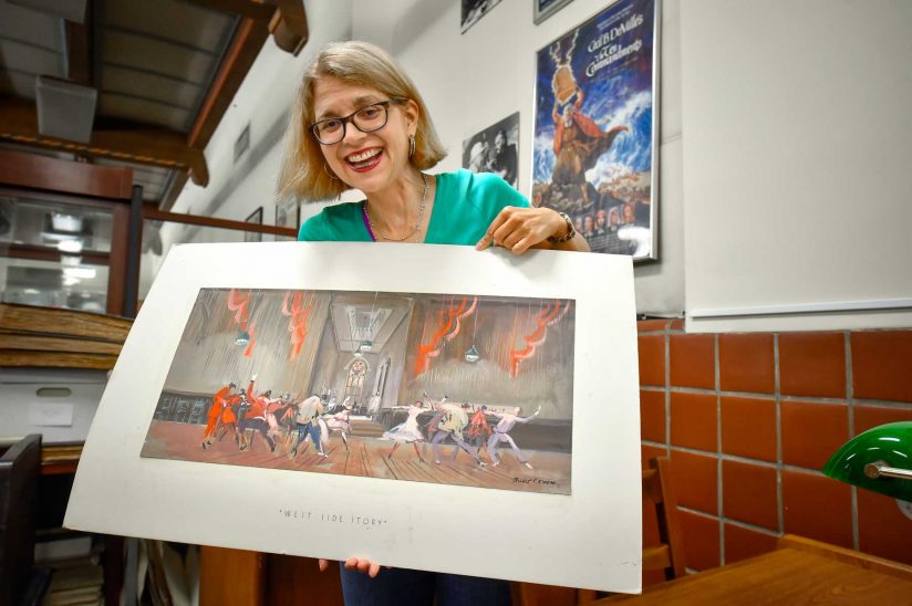 Sandra Garcia-Myers holding story board