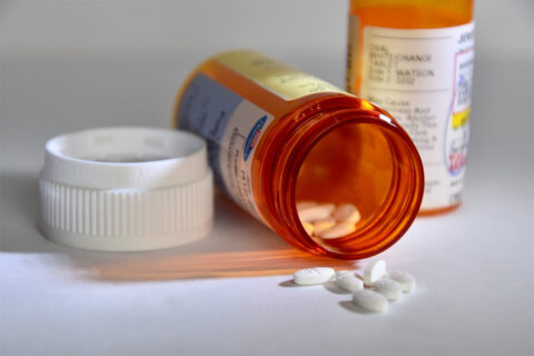 Prescription bottle with pills